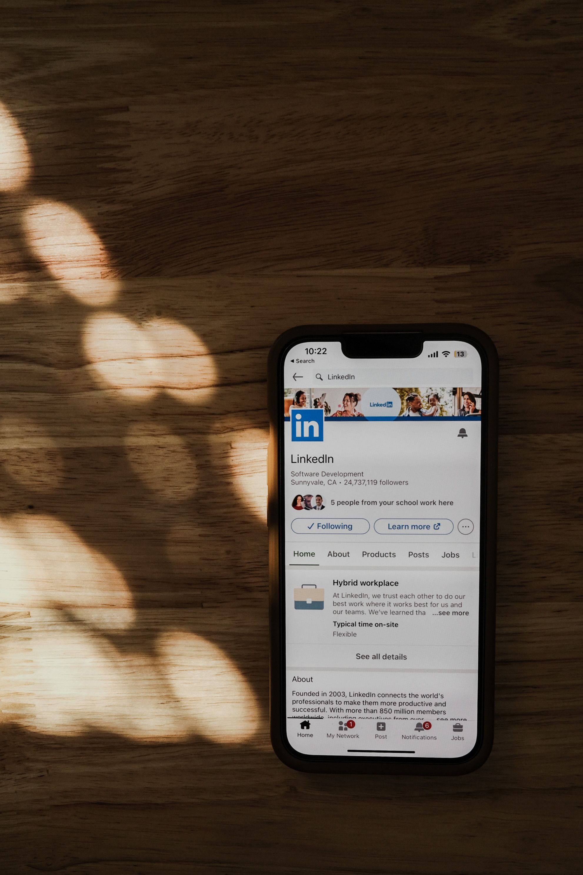 A smartphone screen featuring a LinkedIn profile page | Source: Pexels