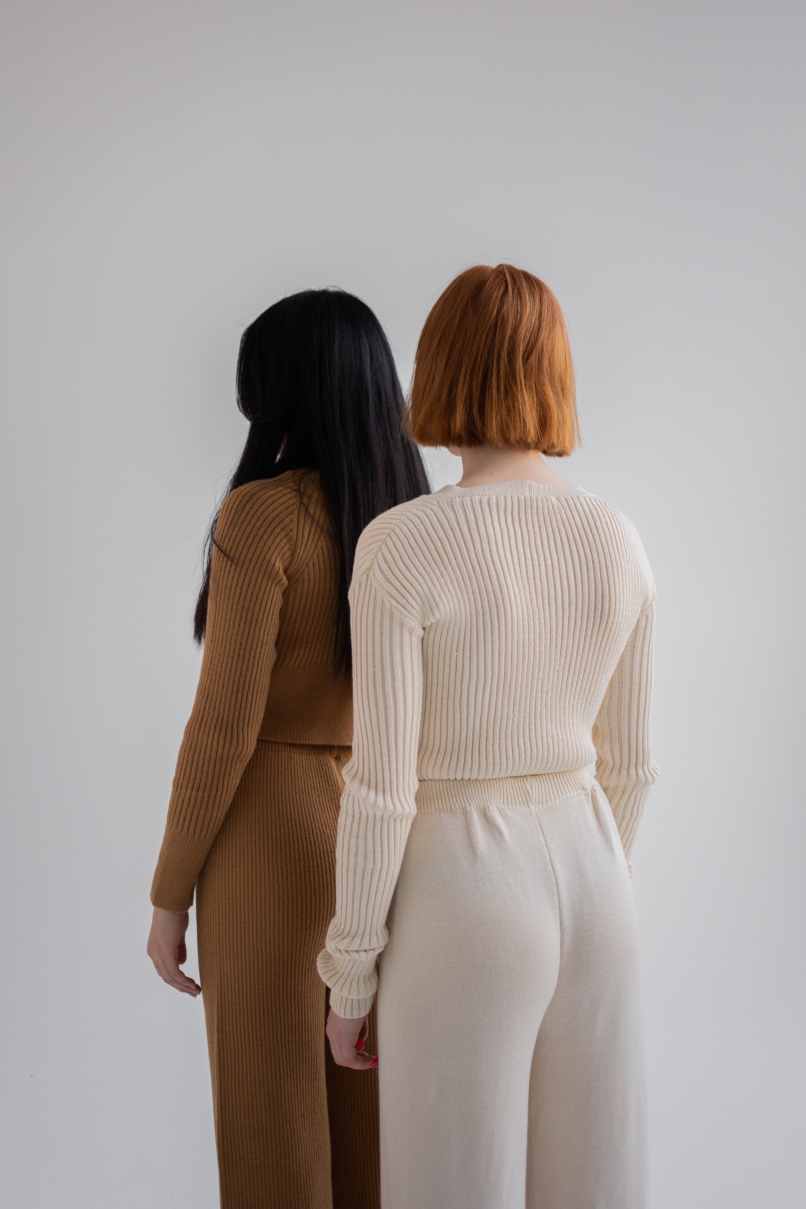 Two women dressed in comfortable pants. | Source: Pexels