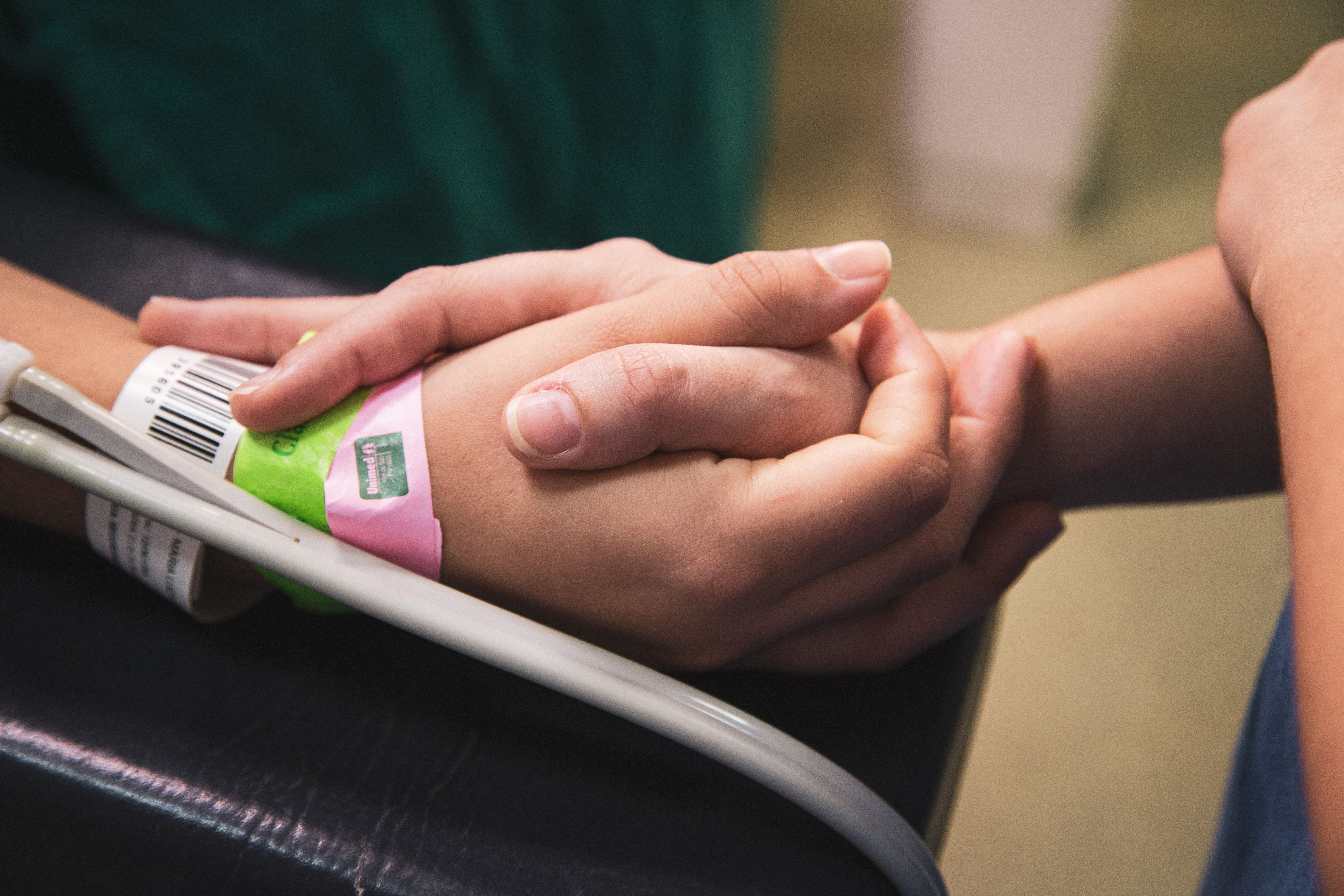 Hands symbolizing comfort and support | Source: Pexels