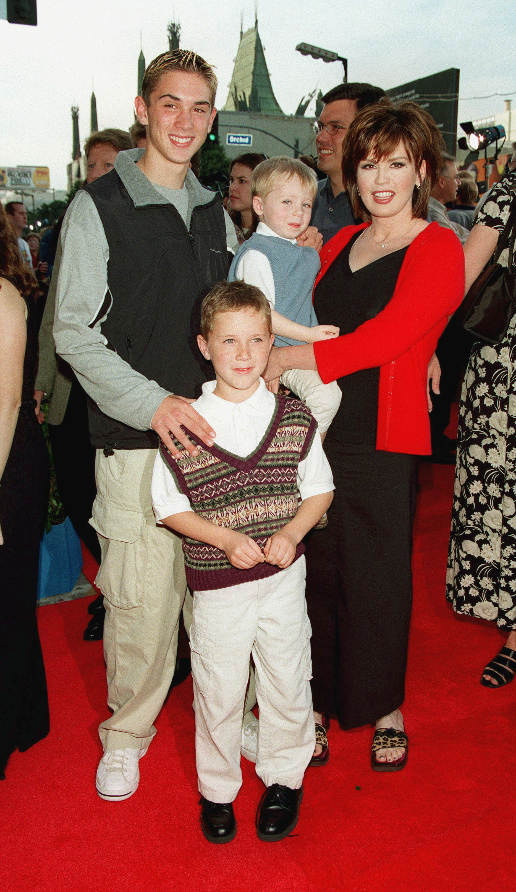 Marie Osmond with sons Stephen, Michael, and Brandon at the "Toy Story 2" premiere on November 13, 1999 | Source: Getty Images