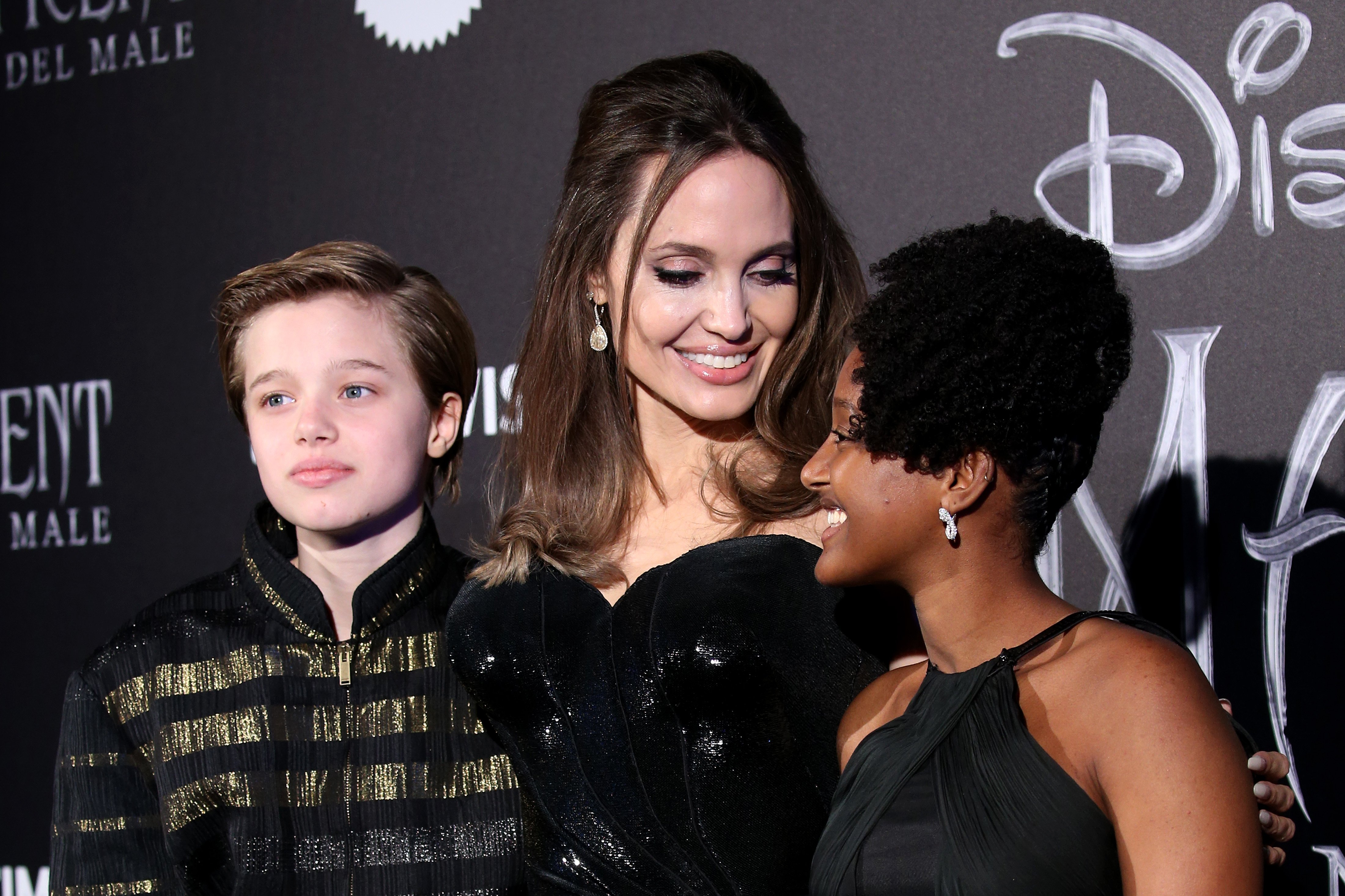 Shiloh Nouvel Jolie-Pitt, Angelina Jolie, and Zahara Marley Jolie-Pitt at the European premiere of "Maleficent – Mistress of Evil" on October 7, 2019, in Rome, Italy | Source: Getty Images