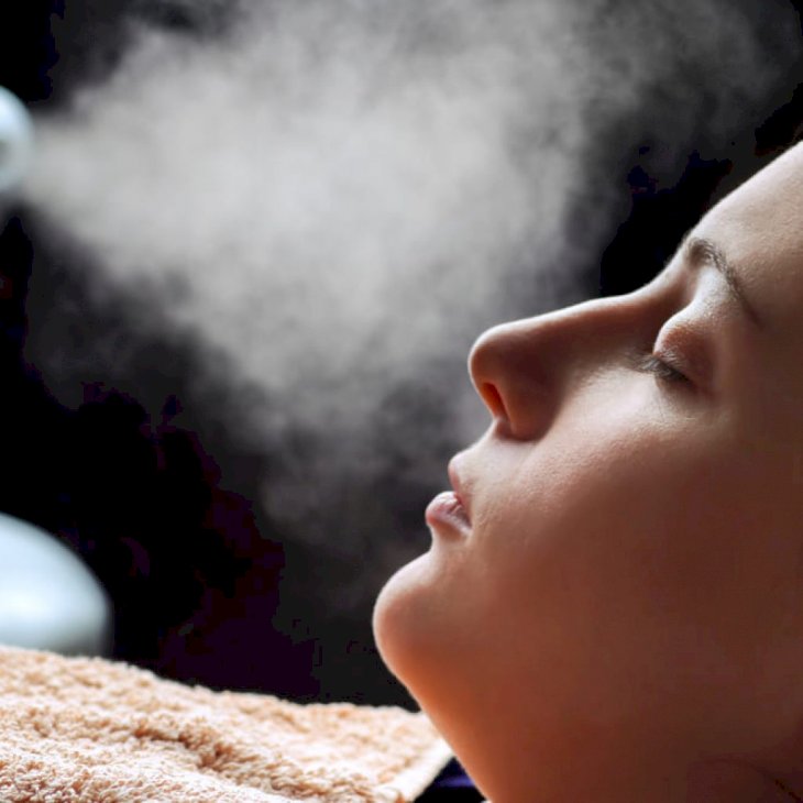 Woman undergoing facial steaming. | Source: Shutterstock