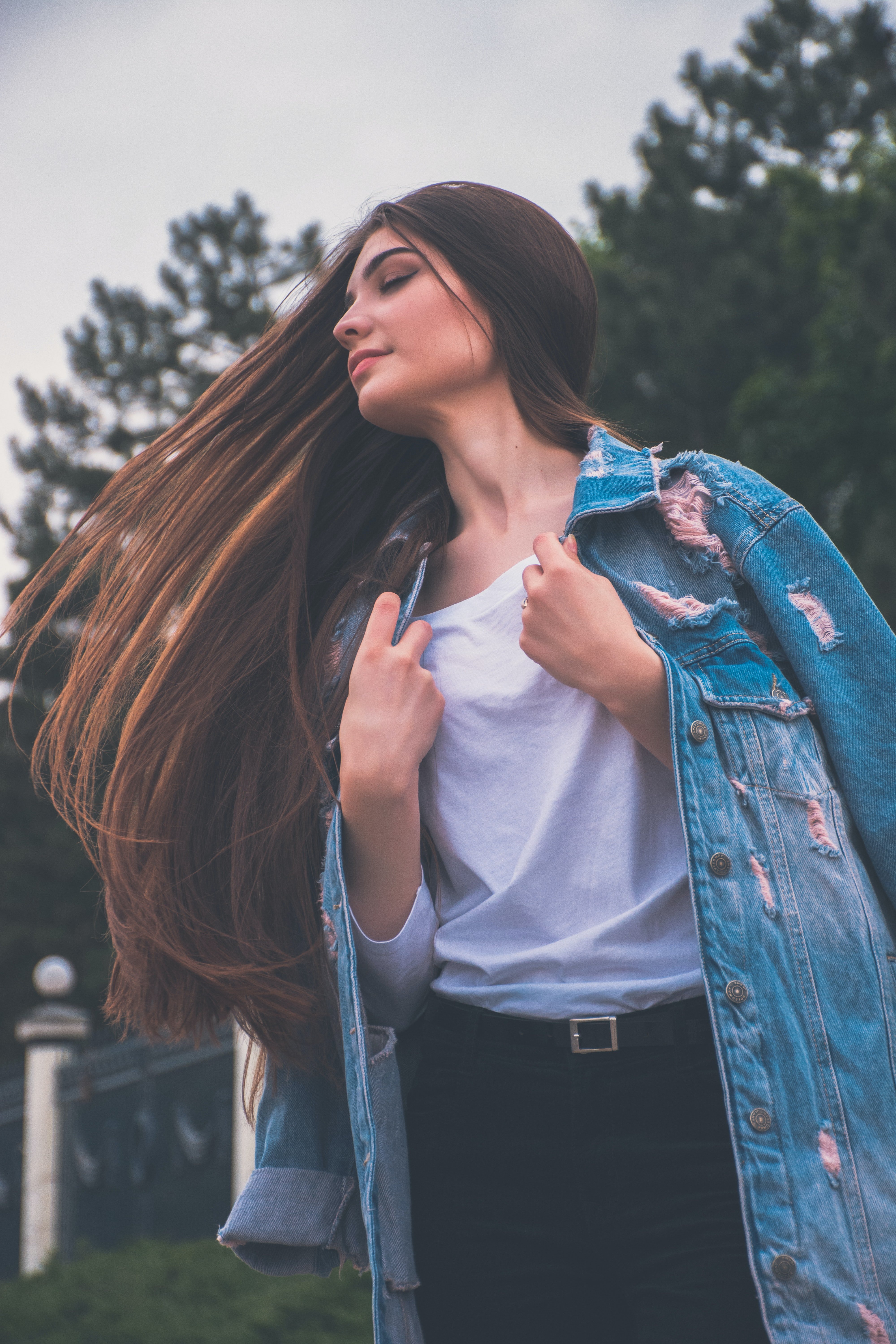 Young woman with long, straight hair | Unsplash