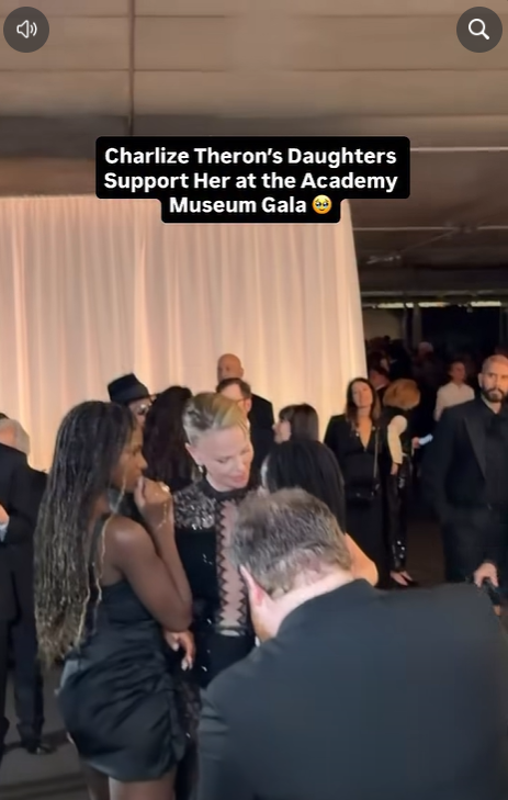 Charlize Theron shares a sweet moment with her daughters, Jackson and August, at the Academy Museum Gala in Los Angeles. The family appearance drew praise online.