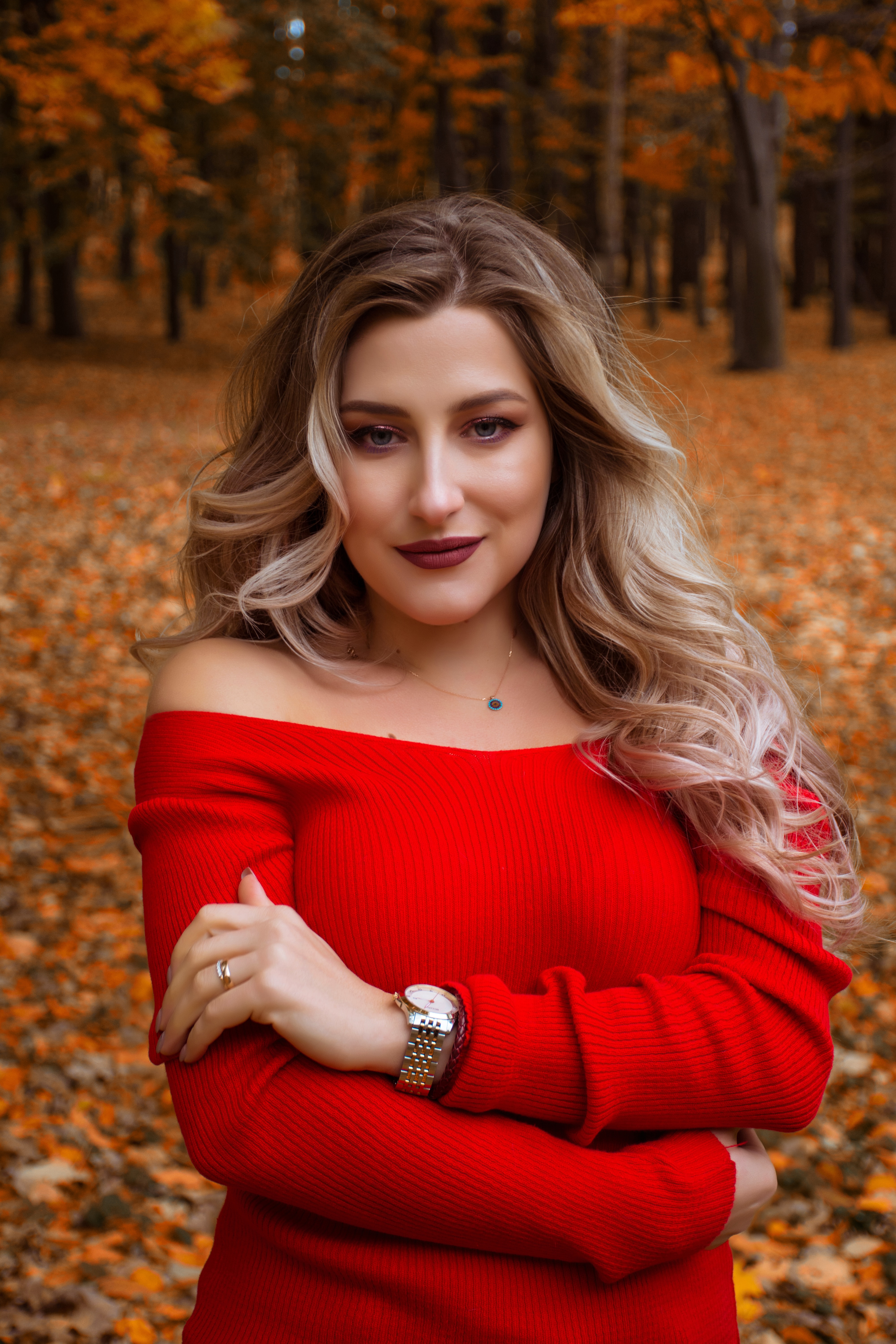 Beautiful woman in a red outfit | Source: Unsplash