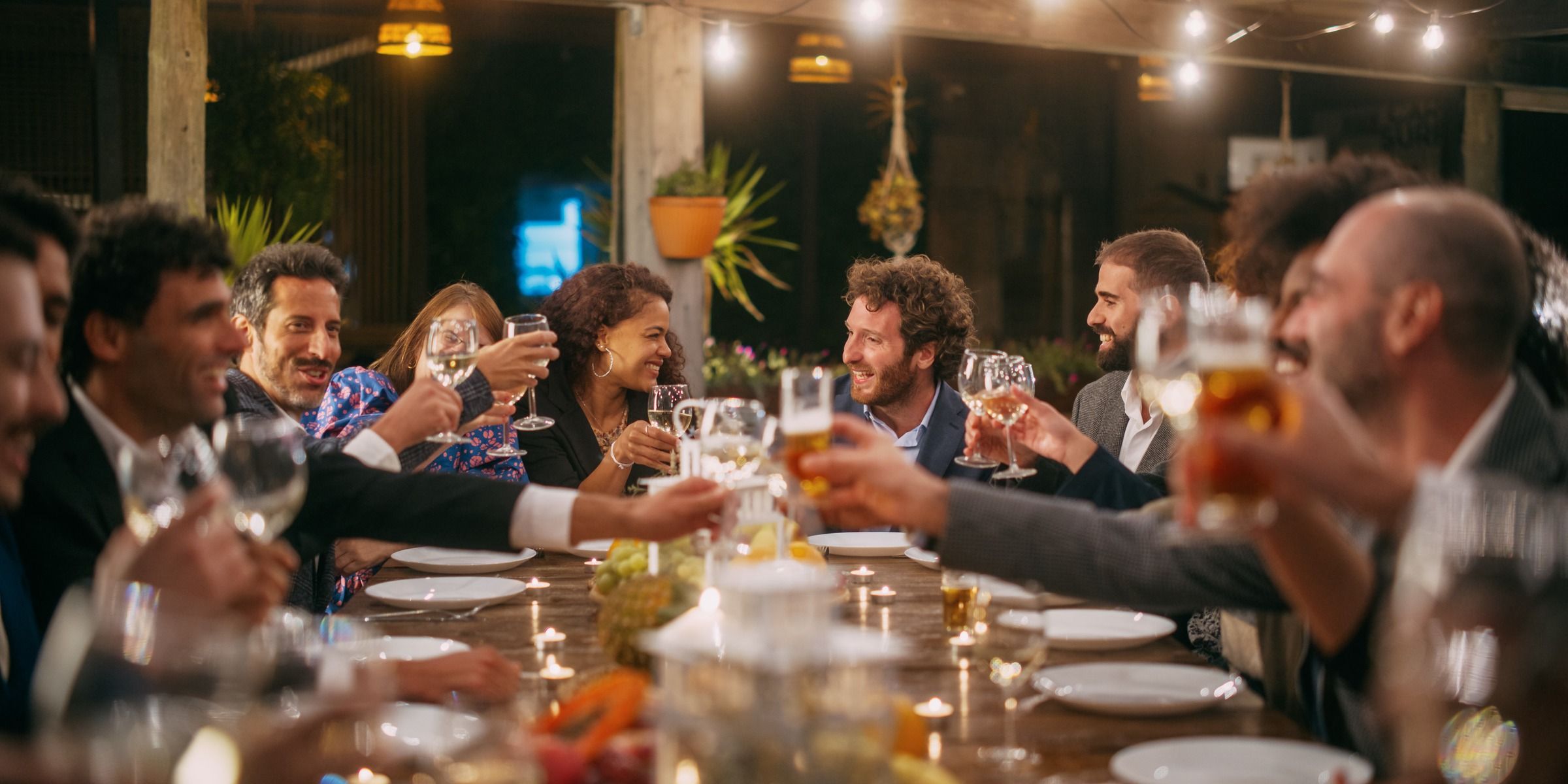 Big dinner party with a small crowd | Source: Shutterstock