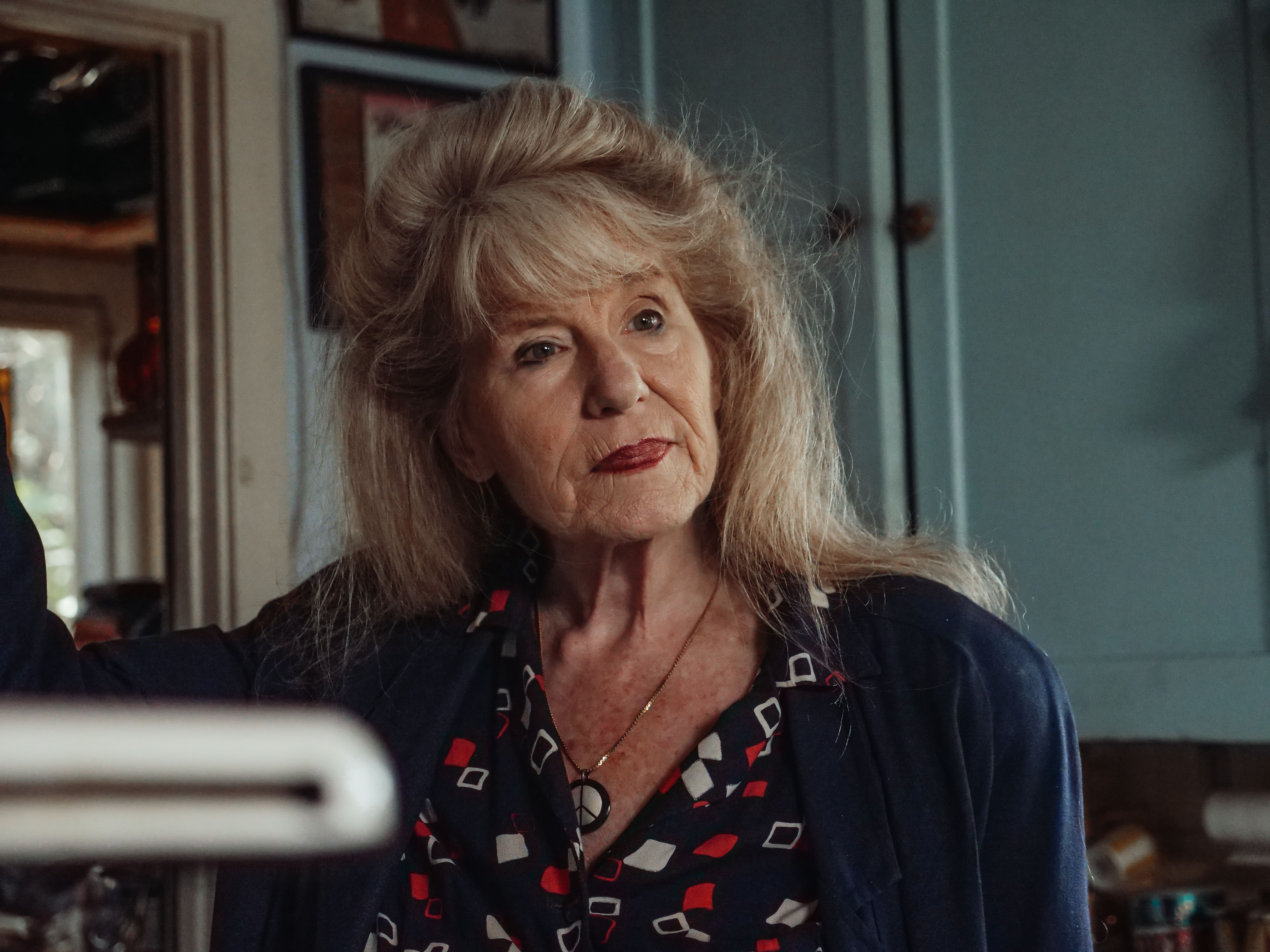 Older woman with long hair and soft bangs | Source: Pexels