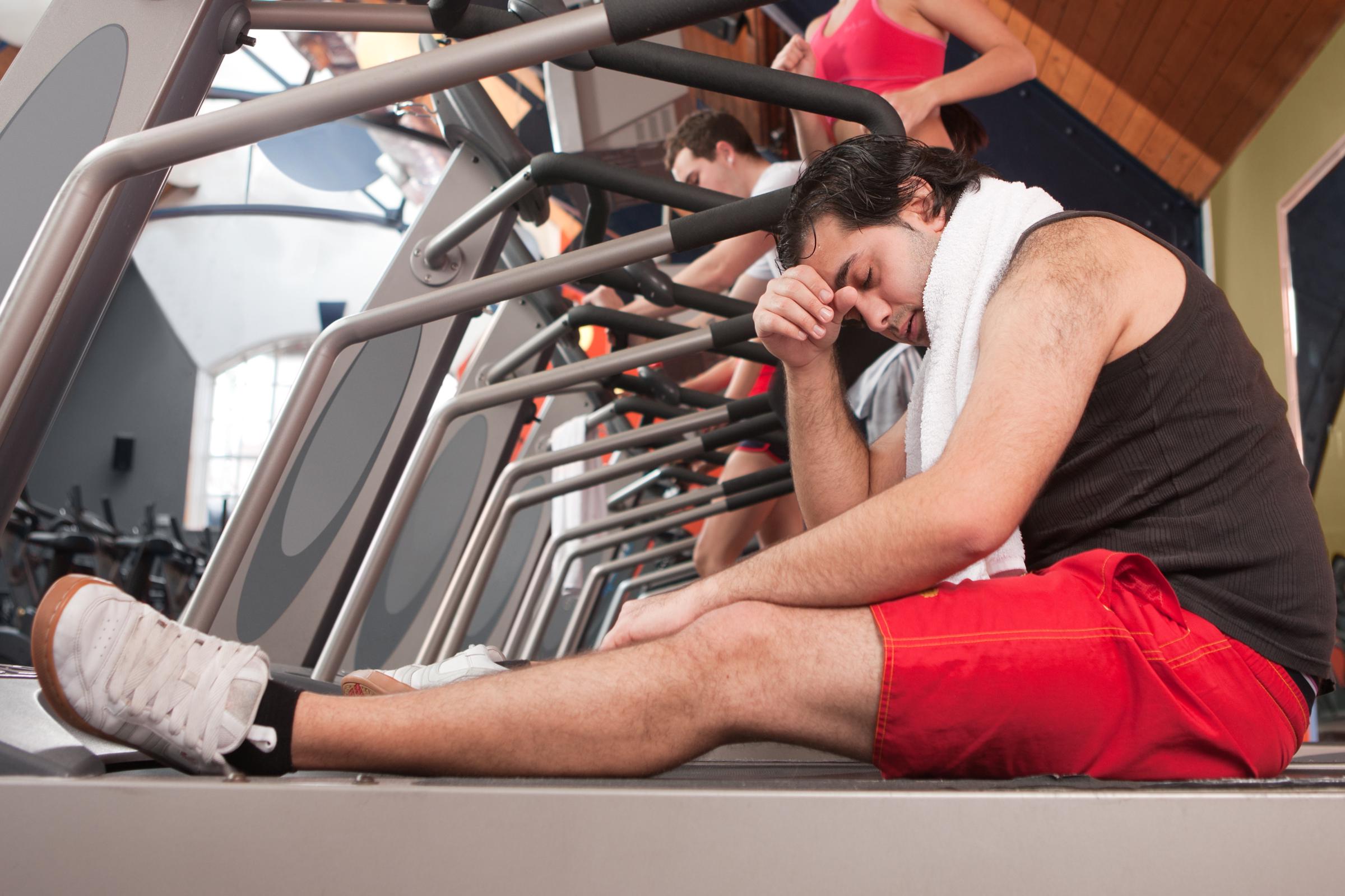 A man sitting on a treadmill | Source: Getty Images