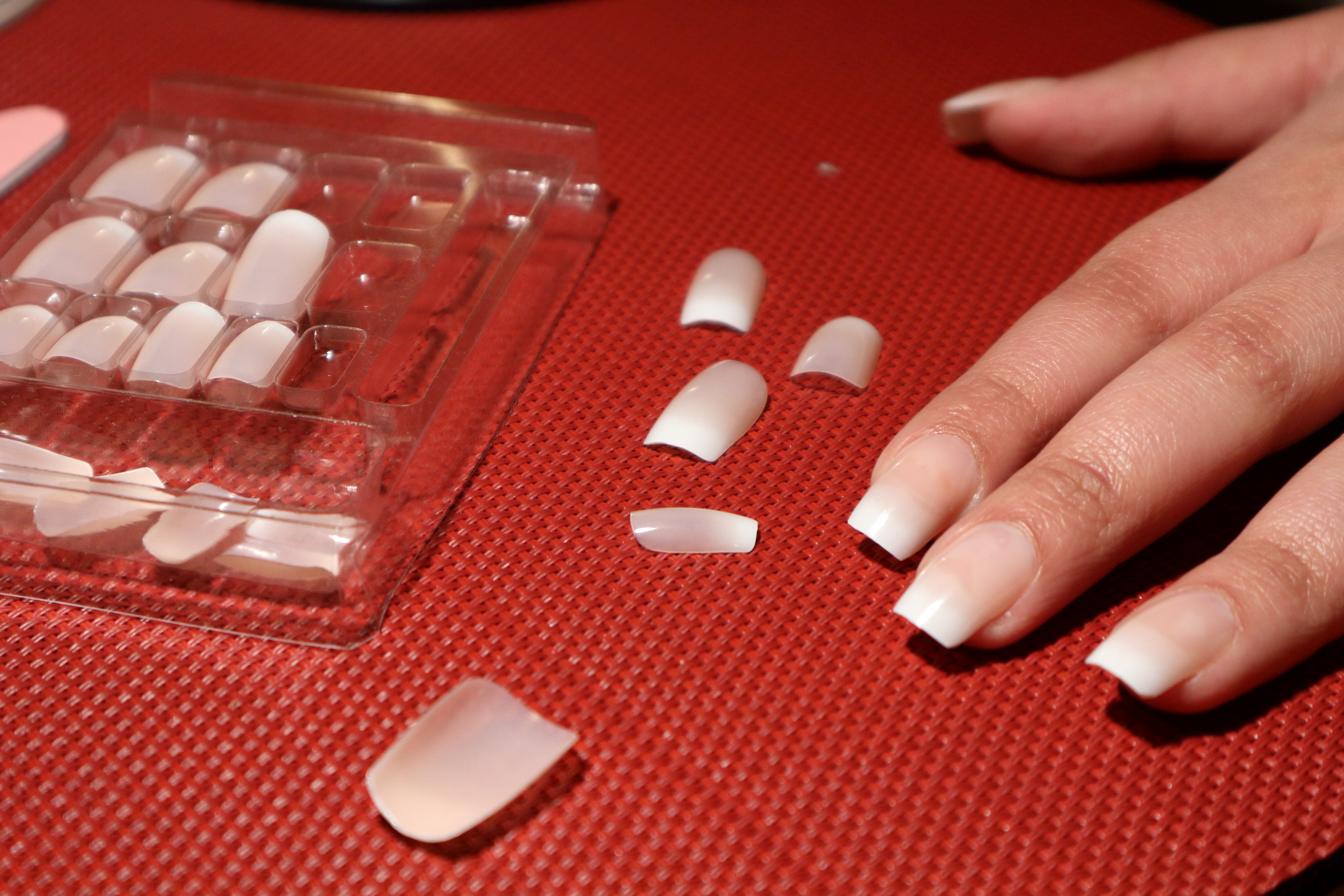 A woman wearing press-on nails. | Source: Getty Images