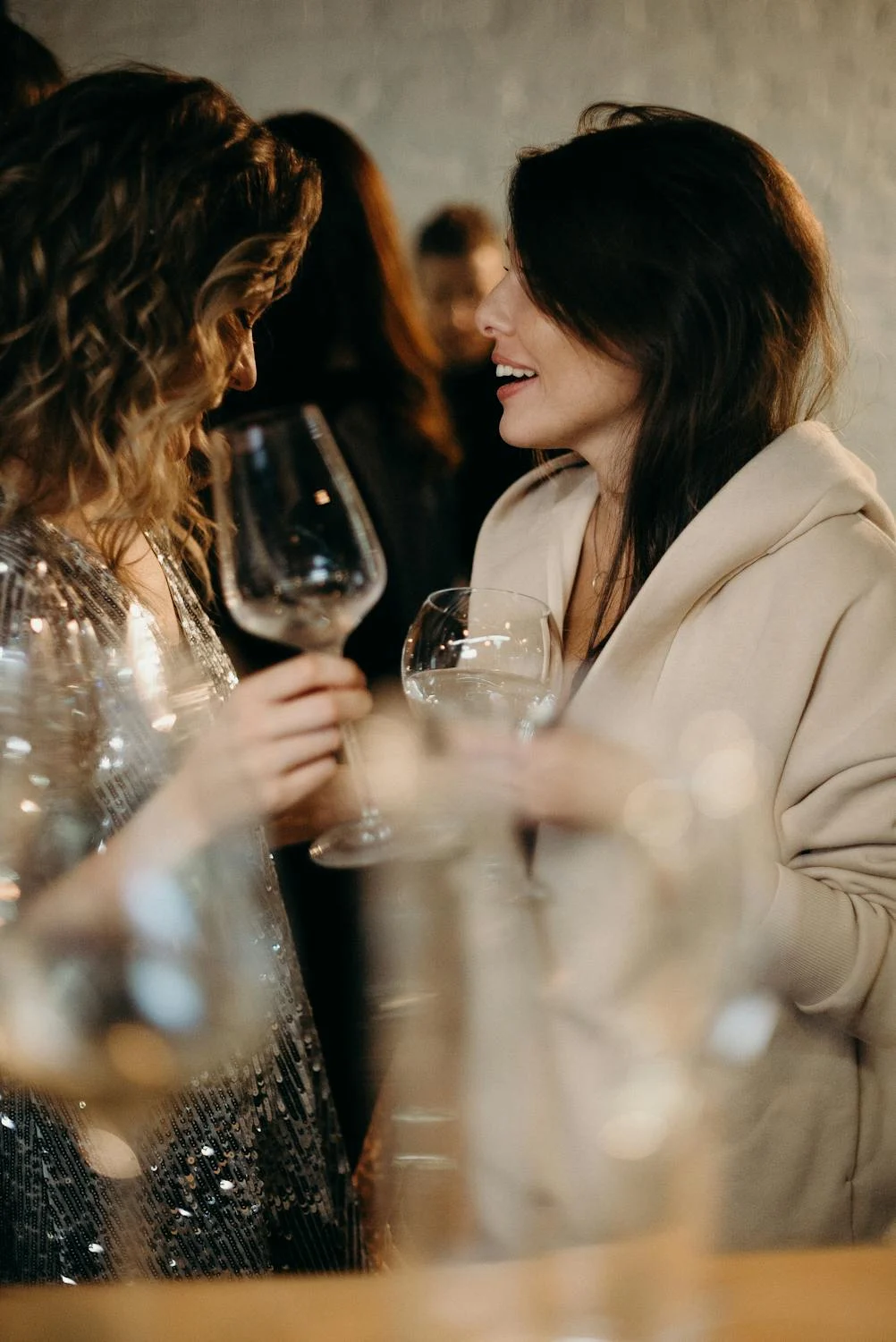 Two women chatting at a party | Source: Pexels