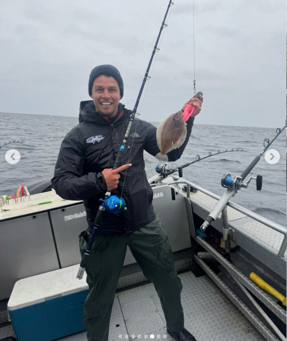 Geared up in rain gear and a beanie, Brendan proudly holds up a freshly caught halibut while braving the open waters on a fishing trip with Miranda. The outdoor snapshot gave admirers another look at how effortlessly the Staten Island native has adapted to country life, animal care, and coastal adventures alongside his superstar wife. | Source: Instagram/mirandalambert