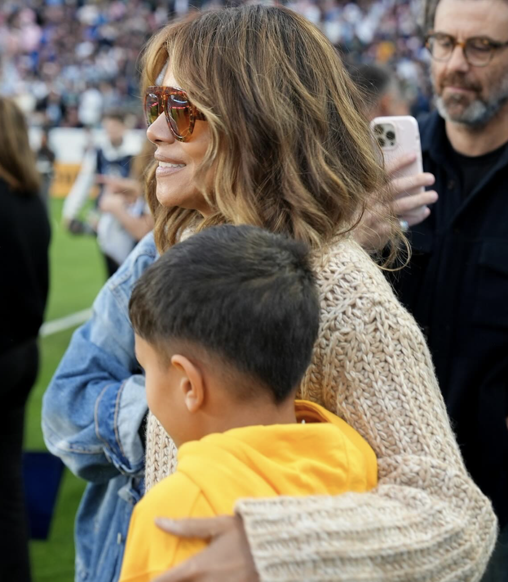 Halle Berry shared a sweet moment with her son Maceo at a sporting event, keeping him close amid the crowd. Maceo is her youngest child, whom she welcomed with former husband Olivier Martinez in 2013. | Source: Instagram via @halleberry