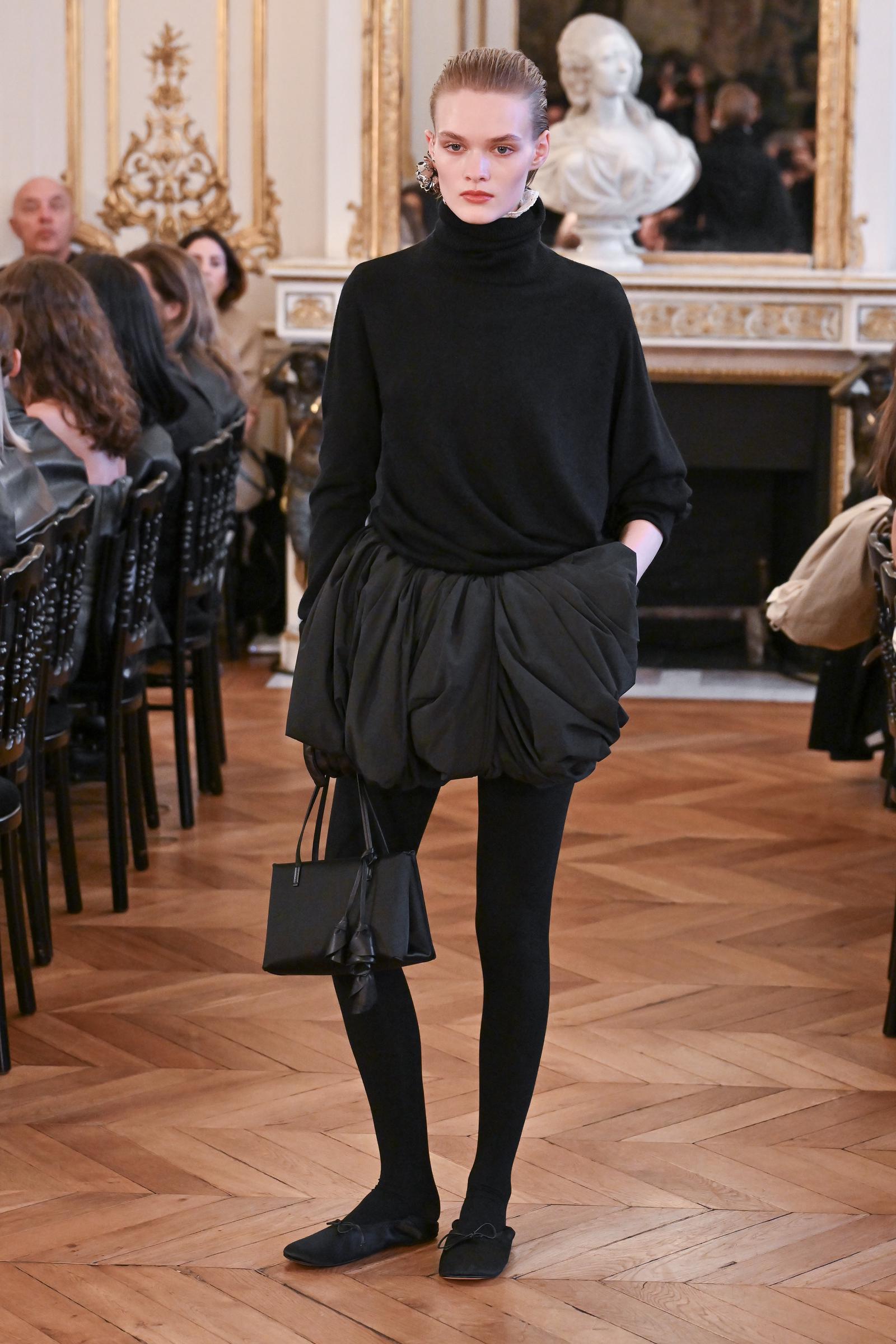 A model walks the runway during the Magda Butrym Womenswear Fall/Winter 2026-2027 presentation as part of Paris Fashion Week on March 08, 2026 | Source: Getty Images