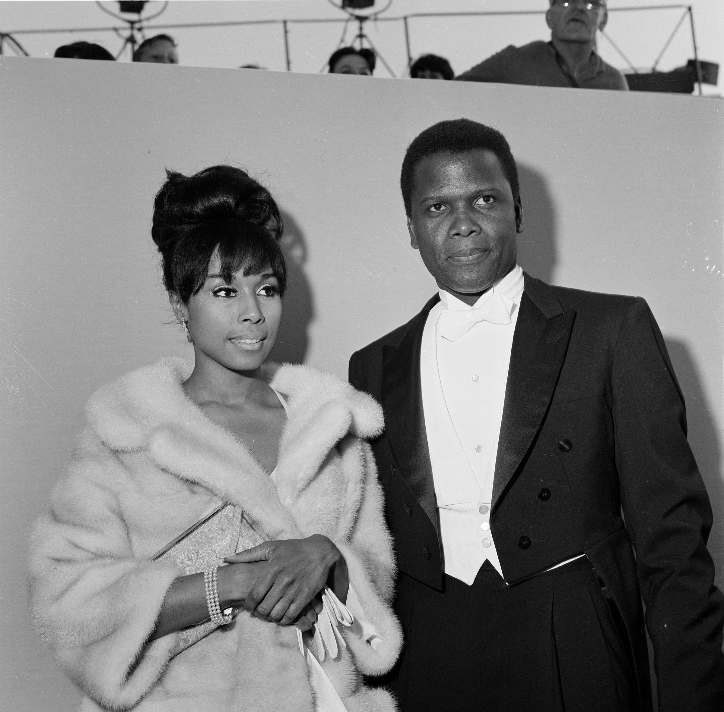 Diahann Carroll and Sidney Poitier attend the 36th Academy Awards on April 13, 1964, in Santa Monica, California. | Source: Getty Images